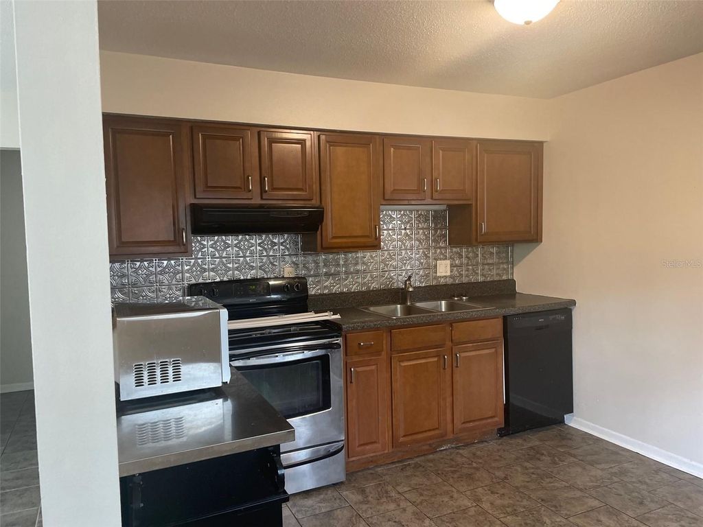 Photo of 204 Callitris Avenue, Polk City, FL 33868 (MLS # L4961190)