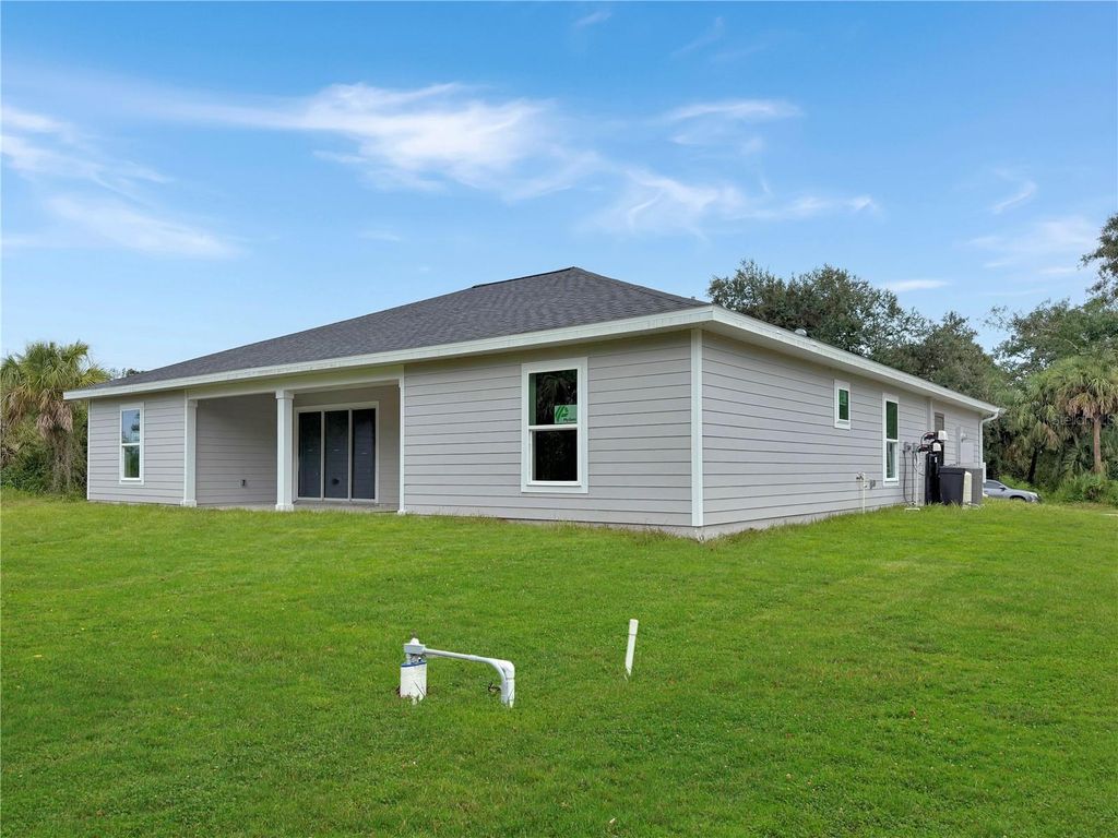 Photo of 16419 Strauss Avenue, Port Charlotte, FL 33954 (MLS # C7512876)