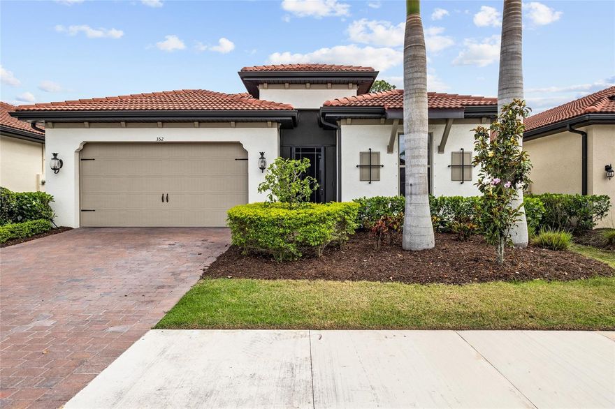 Experience refined Florida living in this beautifully designed 4-bedroom + den, 3.5-bath home, thoughtfully appointed with upscale finishes and set within a gated community with guard just 5–10 minutes from the beach, where endless sunsets await.

Inside, enjoy tall 10-foot ceilings accented with crown molding and tray ceilings, creating a light, open, and elegant atmosphere throughout. Ceramic plank flooring flows through the main living areas, while plush carpeting in the bedrooms adds comfort and warmth. The flexible den is perfect for a home office, media room, or guest space.

Designed for seamless indoor–outdoor living, the home features large three-panel sliding glass doors and a screened front entry, allowing refreshing tropical breezes to flow through the house year-round down the wide long main hallway. The layout includes a dedicated pool bath, already in place for your future pool dreams.

Step outside of the screened lanai with specialty insect-resistant screens and plumbing for an outdoor kitchen, and become surrounded by lush tropical landscaping on your extended patio with space for grilling—perfect for relaxing, dining, or hosting guests. The home backs up to a dense, exceptionally quiet preserve, offering rare privacy and a tranquil setting where you can still hear birds and frogs, creating a true natural retreat. A whole-home surge protector adds peace of mind.

Residents enjoy resort-style amenities including a newly renovated infinity-edge community pool and scenic community lakes perfect for fishing and kayaking for hours of outdoor enjoyment.