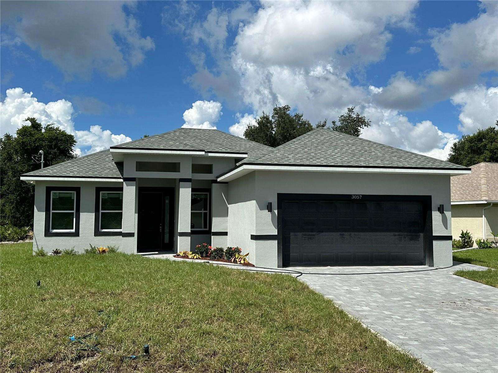 Under Construction. Beautifully designed home with 1,840 sq ft of living space, featuring 3 spacious bedrooms, 2.5 bathrooms, and a 2-car garage. This open-concept layout connects the kitchen and living areas, making it ideal for family gatherings and entertaining. The kitchen is equipped with high-quality appliances and a central island for easy meal prep. A spacious garage comfortably accommodates two vehicles, with additional storage space. With a total area of 2,653 sq ft, including an inviting 82 sq ft entry, a 441 sq ft garage, and a relaxing 290 sq ft lanai, this home offers both functionality and comfort to meet all your lifestyle needs. Additional features include a SMART KEY system for enhanced security and the peace of mind that comes with a 2-10 HOME BUYERS WARRANTY. Don’t miss out—schedule a showing today!