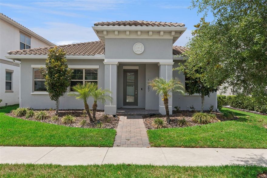 Welcome to 10387 MacDuff Drive—an elegant, single-story Mediterranean-style residence that blends timeless charm with modern luxury in one of Orlando’s most sought-after golf communities Eagle Creek.
At the heart of the home, the gourmet kitchen is designed to impress and inspire. Featuring gleaming quartz countertops, stainless steel appliances, a built-in oven, and custom cabinetry that extends all the way to the ceiling, this space is both functional and stunning. Just beyond, a thoughtfully designed scullery adds convenience and sophistication with its own prep sink and granite countertops—perfect for entertaining or keeping the main kitchen pristine.
The spacious living room offers a warm yet refined atmosphere, enhanced by custom lighting and expansive pocket sliding doors. These open seamlessly to a screened-in porch, creating an effortless flow between indoor and outdoor living—ideal for relaxing evenings or hosting gatherings year-round.
The large master suite is a private sanctuary, offering both comfort and luxury. Enjoy an oversized walk-in shower, dual vanities, and an oversized walk-in closet designed for optimal organization. Every detail has been carefully curated to create a spa-like experience at home.
Two additional bedrooms provide ample space for family or guests, complemented by a well-appointed second bathroom that maintains the home’s elevated style and finishes.
An inside laundry room adds everyday convenience, while the drop-zone mudroom just off the two-car garage is as practical as it is stylish—complete with built-in cabinetry and benches to keep everything organized and within reach.
Situated in the beautiful Eagle Creek community, this home benefits from meticulously maintained surroundings and resort-style amenities including a championship golf course, tennis courts, a fitness center, clubhouse, community pool, and playgrounds. Just minutes from premier shopping, dining, and everything Lake Nona has to offer, this location delivers both tranquility and accessibility.

A rare blend of comfort, design, and location, this home offers an exceptional opportunity to experience elevated Florida living at its finest.