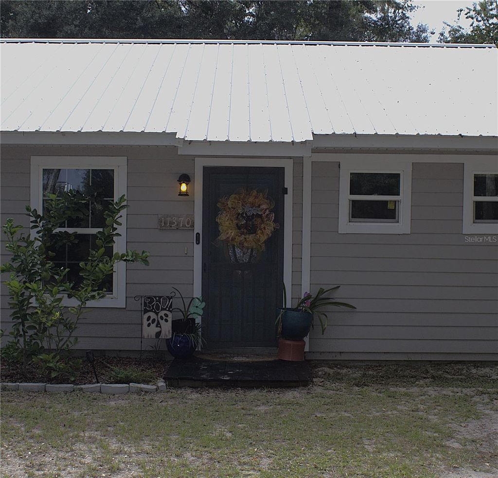 Photo of 11370 SW 175th Court, Dunnellon, FL 34432 (MLS # OM710886)