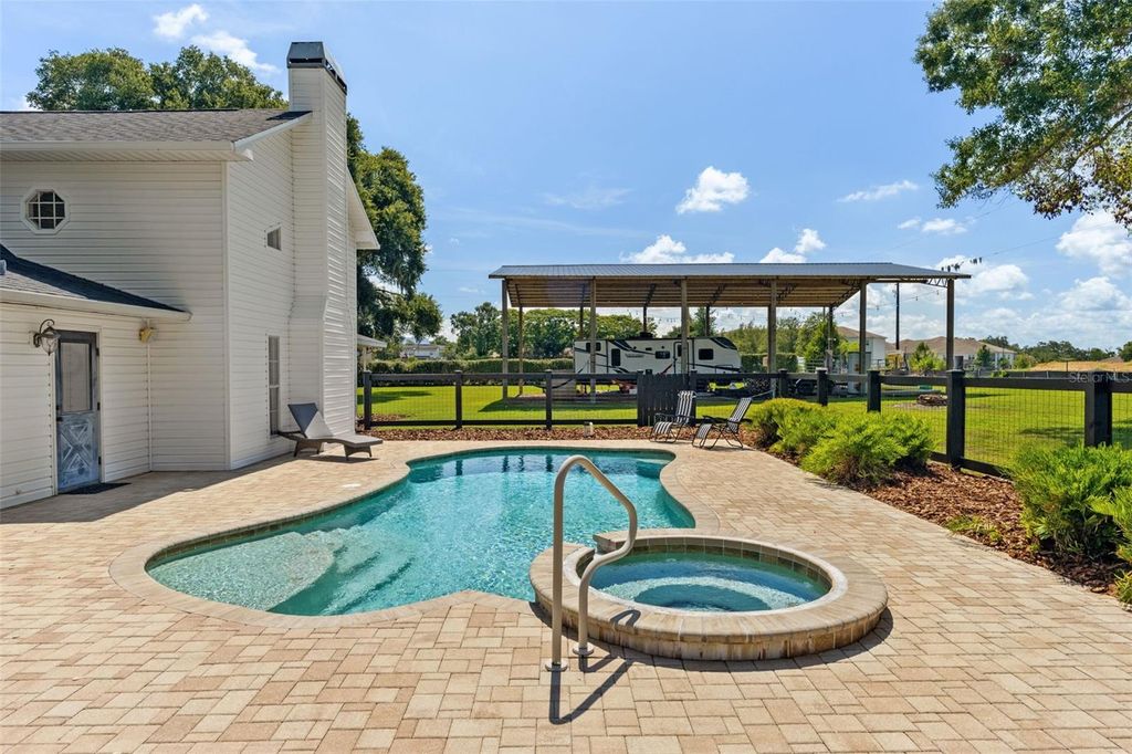 Photo of 37714 Fairfield Lane, Dade City, FL 33525 (MLS # TB8525550)