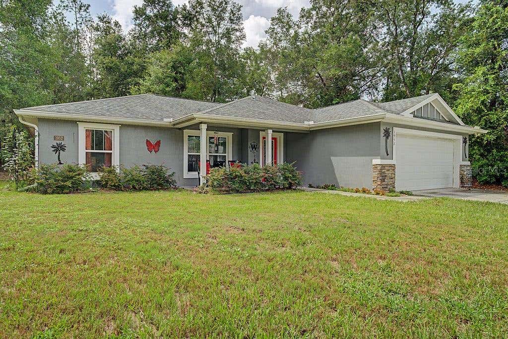 Photo of 1952 W Rutland Drive, Citrus Springs, FL 34434 (MLS # OM729362)