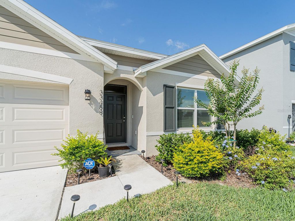 Photo of 33488 Elm Hill Branch, Wesley Chapel, FL 33545 (MLS # TB8391391)