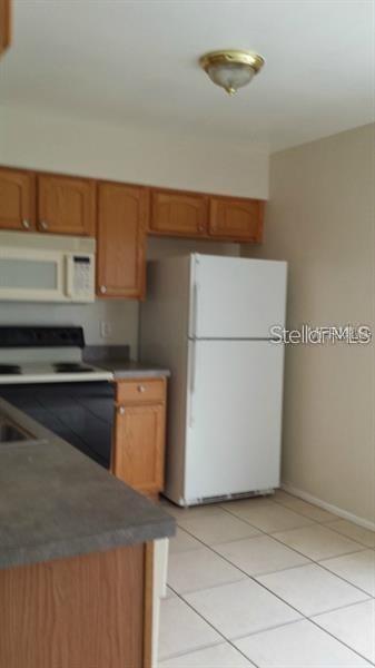 RICH MOOR VILLAS AT GOLDENROD - Residential Lease