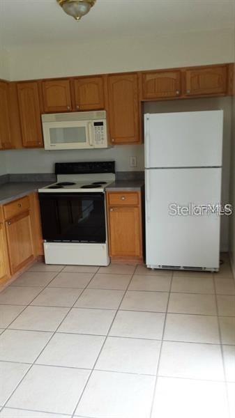 RICH MOOR VILLAS AT GOLDENROD - Residential Lease