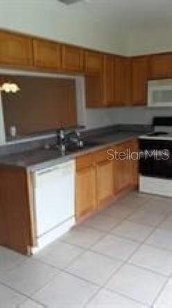 RICH MOOR VILLAS AT GOLDENROD - Residential Lease