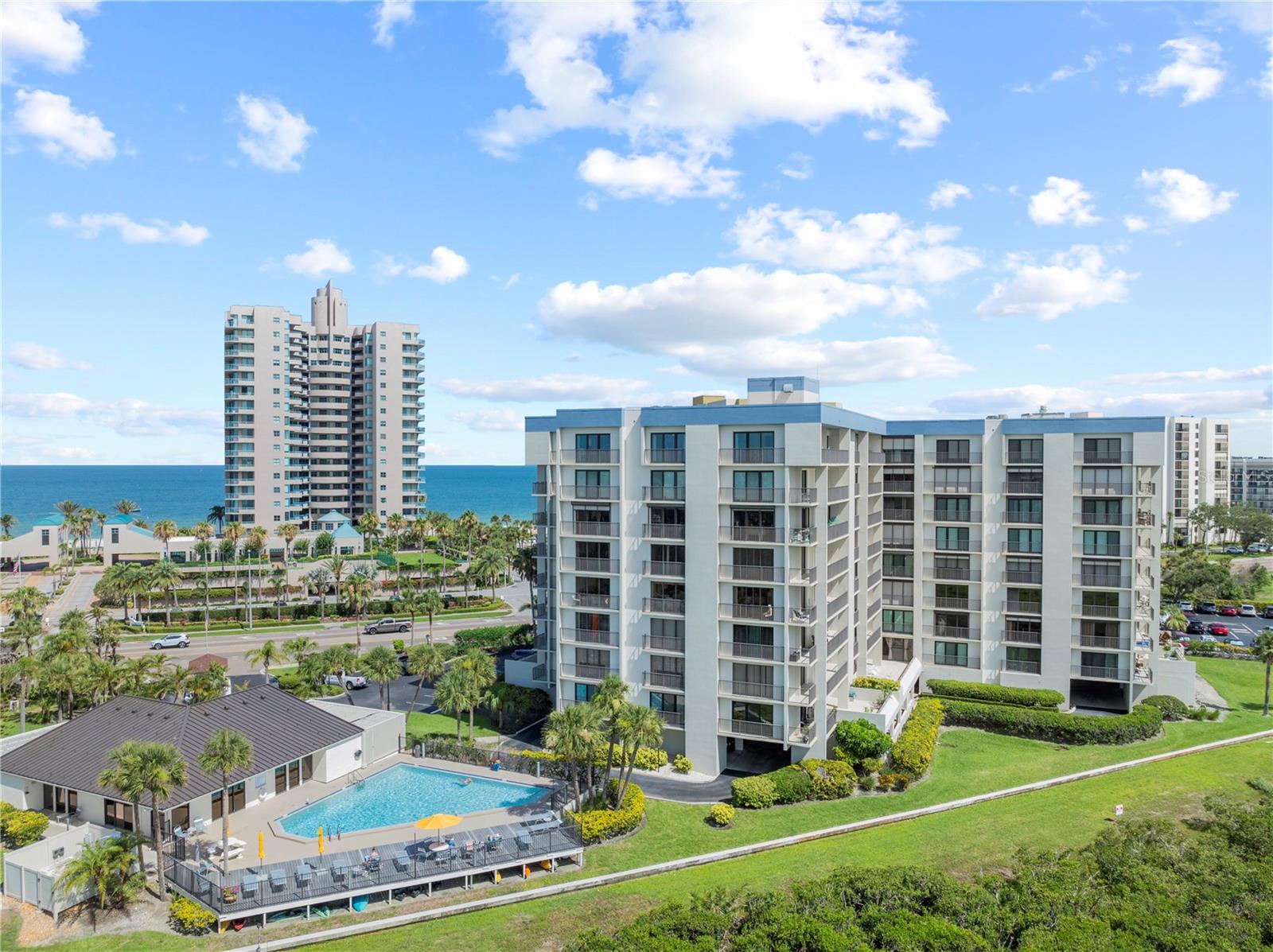 Welcome to your slice of paradise with this meticulously renovated, FULLY FURNISHED 2-bedroom, 2-bathroom luxury residence in Sand Key, one of Clearwater Beach’s most coveted communities. From the moment you enter, every detail speaks of quality and style, from the warm BAMBOO FLOORING throughout to the modern kitchen featuring abundant cabinetry, gleaming stone countertops & backsplash, stainless steel appliances, and a statement tray ceiling with dramatic UP-LIGHTING. An open-concept layout connects effortlessly to a generous PRIVATE BALCONY accessible from every room via FLOOR-TO-CEILING sliders, perfect for taking in the coastal breeze. Both bathrooms have been beautifully updated, offering full subway tile surrounds for easy cleaning. The primary boasts HIS & HER OVERSIZED CLOSETS and a tub/shower surround while the hall bath provides for a walk-in shower. This condo includes TWO STORAGE CLOSETS and a dedicated COVERED SPARKING SPACE, plus ample guest parking. All major systems have been RECENTLY REPLACED, reflecting the meticulous care taken by the full-time resident. Enjoy the exclusive amenities: a pristine COMMUNITY POOL, elegant clubhouse, and direct access to the Intracoastal for kayaking and paddle boarding. Best of all, your front door is just STEPS AWAY from the powdery white sands of Clearwater Beach. Don't forget to take advantage of the city-provided TENNIS COURTS directly adjacent! HOA fee COVERS ALL UTILITIES except electric and includes building insurance, offering peace of mind and simplified living. Whether you're looking for a full-time residence or a luxurious getaway, this condo is the total package in one of Florida’s most sought-after locations. Bring your suitcase and settle in...