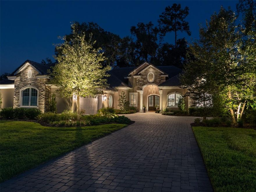 You will not want to miss this one!  Located at the end of a cul de sac right on the 7th Fairway of Brittany Estates of Golden Ocala, this home offers a quiet and peaceful setting with fantastic views!  You won't have to go far to find great food and entertainment; it's all a short golf cart ride away.  You're sure to be a frequent visitor at both Golden Ocala's club as well as one or all of the delightful restaurants and pubs next door at the World Equestrian Center.  This luxurious custom home exudes sophistication and artful design at every turn.  It features a double door entrance to a beautiful foyer with stone accents, beautiful and durable porcelain tile floors throughout, crown molding, ceiling fans, and exquisite stone fireplace.  The eat in island kitchen would surely satisfy the tastes of the most discerning chef with its beautiful lighting, stunning cabinetry, and high-end fixtures and appliances.  The home has an abundance of windows, providing great views out onto the fairway from the living and dining areas.    The master bedroom suite is nothing short of luxurious; it has his and her walk in closets, and a spa-like bathroom suite fit for a king.  Rounding out this incredible home is the lanai which has a full outdoor kitchen, dining and lounging areas, porcelain tile flooring, and heavy-duty infinity screen for less than perfect weather days.  Speaking of inclement weather - there is also a full house Generac generator to keep everything working for those hurricane parties!  The back yard is completely fenced with HOA approved fencing and also privacy hedges that continue around to the side yard. All of the grounds are meticulously manicured and landscaped, and include a professionally designed outdoor lighting system with 39 lights and automated astronomical timing. This home is move-in ready for both you and your pets.