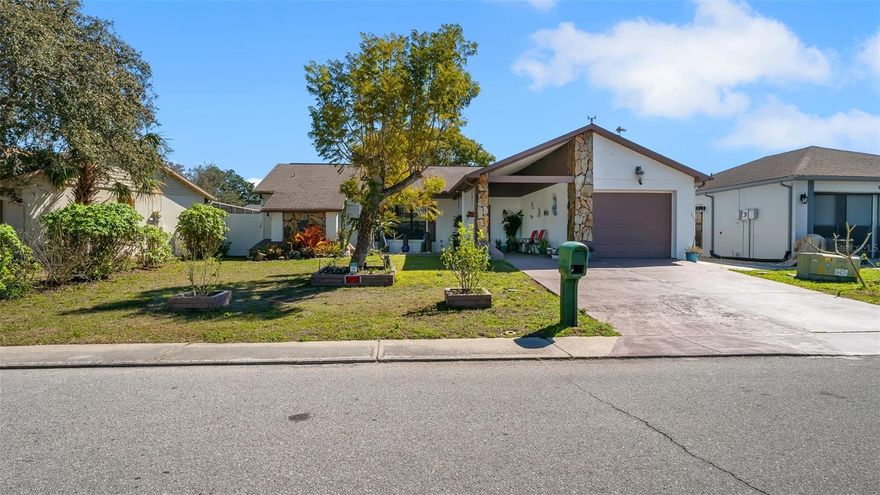 Charming 3-bedroom, 2-bath home located in the desirable Regency Park community of Port Richey. This inviting home features a spacious family room that flows seamlessly into the dining area, creating an ideal layout for everyday living and entertaining. The kitchen offers abundant cabinet and counter space, along with a cozy breakfast nook perfect for morning coffee.

The primary suite includes a walk-in closet and a private en-suite bath complete with both a tub and separate shower. Step outside to unwind on the screened patio overlooking the fully fenced backyard — great for pets, gatherings, or simply enjoying Florida’s beautiful weather.

Conveniently located near shopping, popular restaurants, and major roadways, this home provides an easy commute to Clearwater, Tampa, and surrounding areas. Don’t miss the opportunity to make this home yours. 
***Washer and dryer not included in sale***