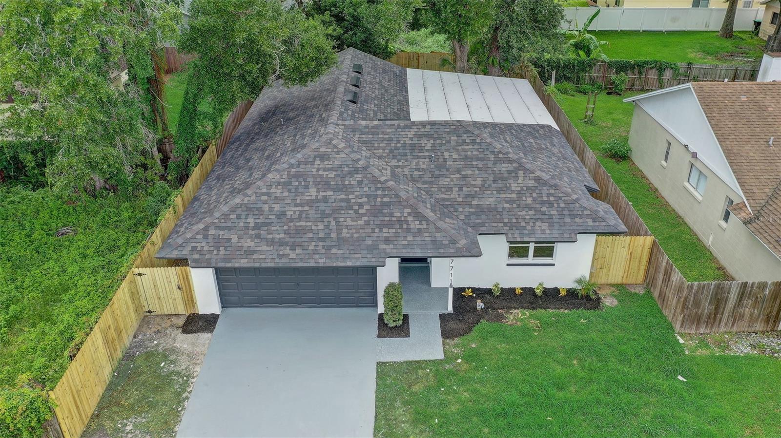 7711 LAKESIDE WOODS DRIVE