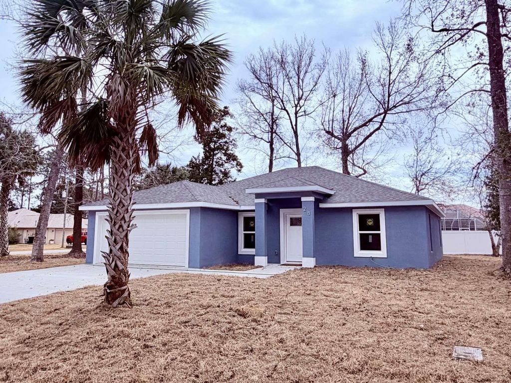 Photo of 28 Woodston Lane, Palm Coast, FL 32164 (MLS # TB8481775)