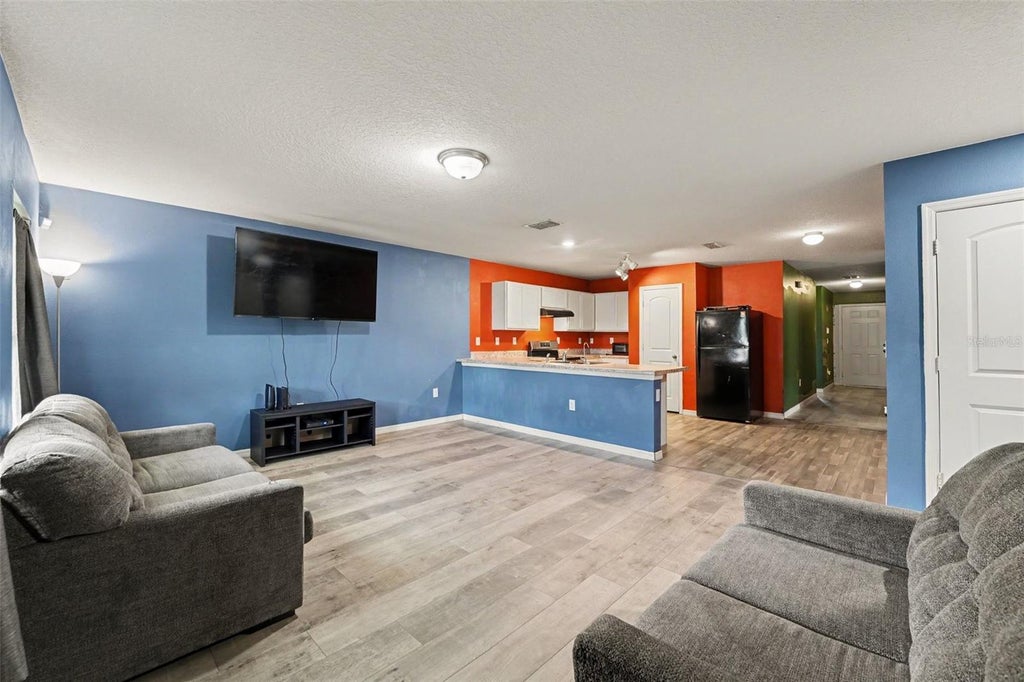 Photo of 280 Fig Court, Poinciana, FL 34759 (MLS # TB8552170)