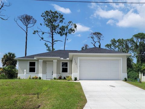 Photo of 2294 Trimble Avenue, North Port, FL 34288 (MLS # A4661600) Photo of 2294 Trimble Avenue, North Port, FL 34288 (MLS # A4661600)