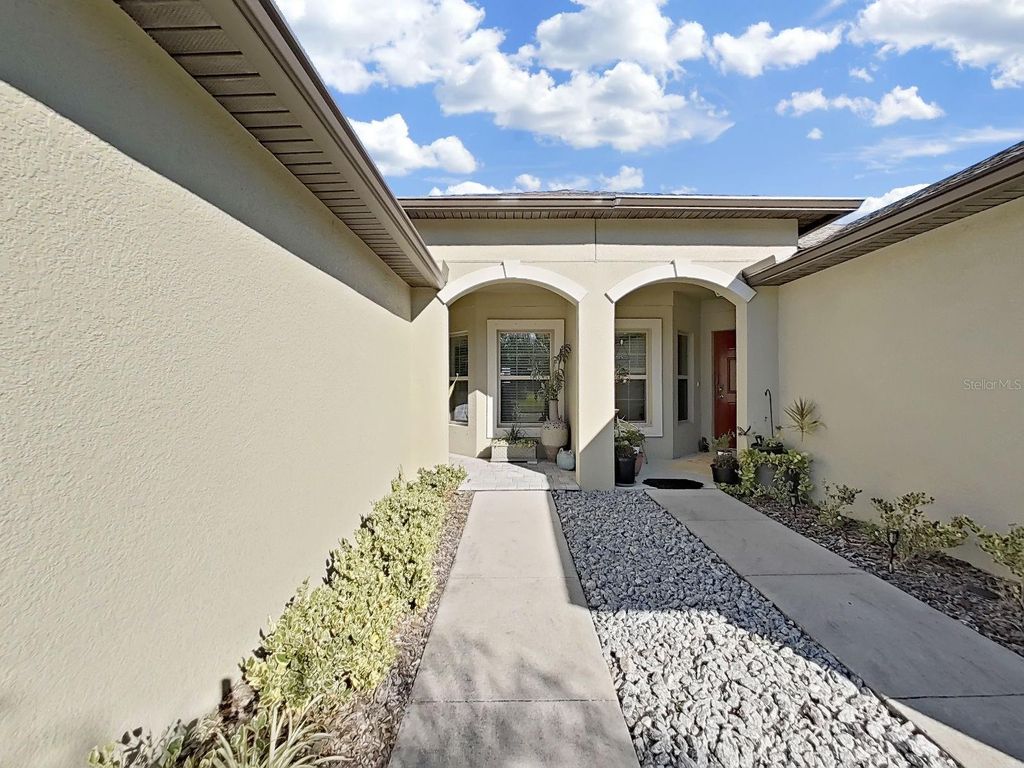 Photo of 13371 Crest Lake Drive, Hudson, FL 34669 (MLS # TB8471751)