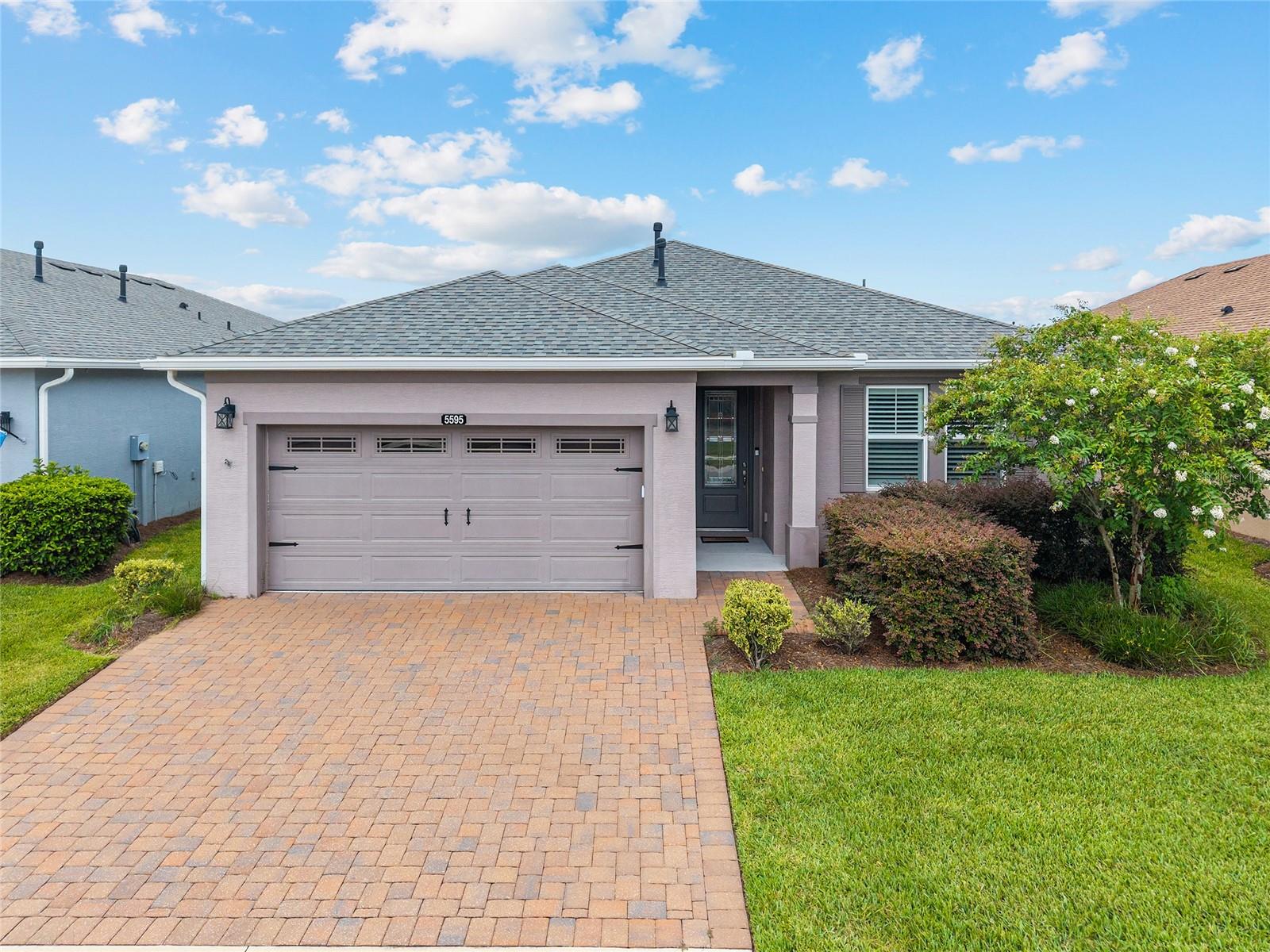 FULLY FURNISHED Affirm model in the resort-style community of Ocala Preserve! This beautifully decorated home offers nearly 1,700 square feet of living space with 2 bedrooms, 2 bathrooms, plus a versatile office/den and a 2-car garage. Built in 2019, it features countless upgrades throughout. Step inside through the glass-inset front door and you’ll immediately notice the wood-look tile flooring, crown molding, and high-end finishes. The bright kitchen showcases white cabinets with under-cabinet lighting, a clean white backsplash, quartz countertops, upgraded stainless steel gas appliances, and a spacious pantry. The oversized island is perfect for entertaining, opening seamlessly into the dining and living area. The spacious living room is enhanced by plantation shutters, large sliders with roller shades, and access to the covered lanai and screened patio — perfect for enjoying Florida evenings. The primary suite features plush upgraded carpet, a spa-like ensuite bath with dual sinks, a walk-in shower, and a generous walk-in closet. The guest suite is thoughtfully placed with its own oversized bedroom and stylish full bath. Additional highlights include barn doors, an epoxy-finished garage floor, and a PET-FRIENDLY fenced backyard. Located just a short walk to the clubhouse, this home offers one of the best spots in the community. Ocala Preserve is known for its world-class amenities: golf course, pickleball, tennis, fitness center, spa, clubhouse, pool, miles of walking/biking trails, dog park, and more. Sellers will consider including the golf cart with an acceptable offer. Call today to schedule your private tour of this move-in-ready, fully furnished gem!