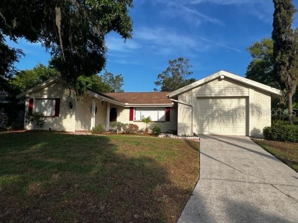 Photo of 12415 Stagecoach Lane, Hudson, FL 34667 (MLS # TB8386971)