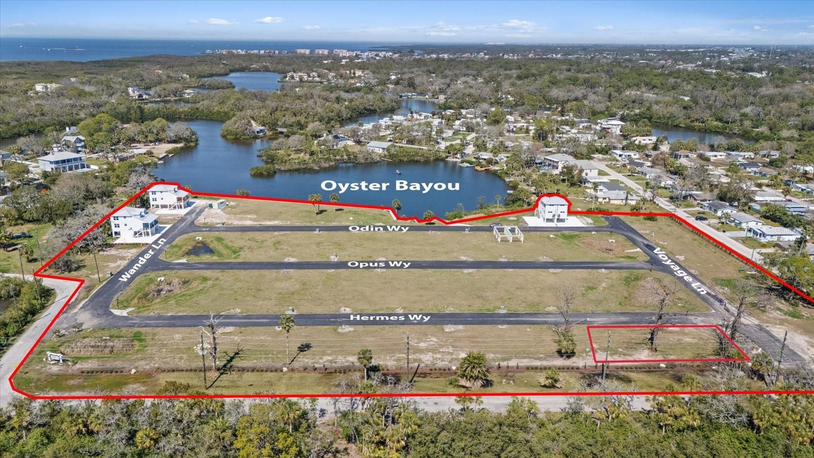 COTTAGES/OYSTER BAYOU TRACTS A - Land