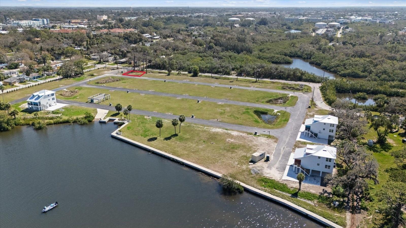 COTTAGES/OYSTER BAYOU TRACTS A - Land