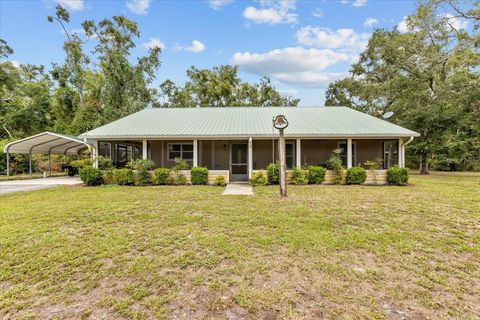 Photo of 303 NE 290th Avenue, Old Town, FL 32680 (MLS # GC537685)