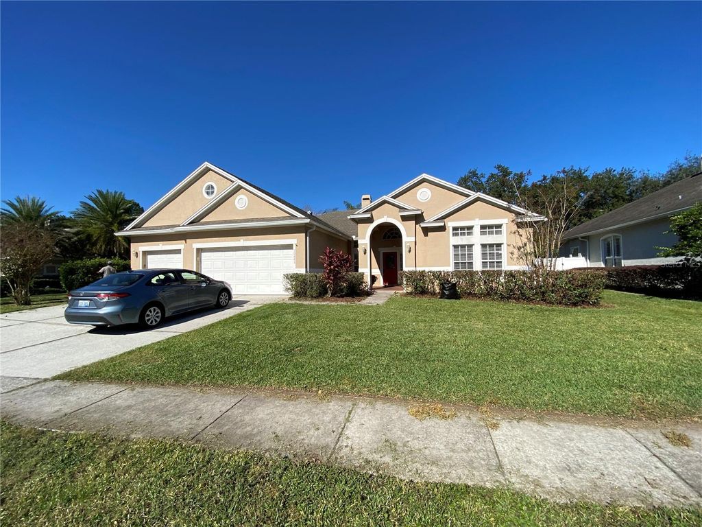 Photo of 10885 Piping Rock Circle, Orlando, FL 32817 (MLS # O6411179)