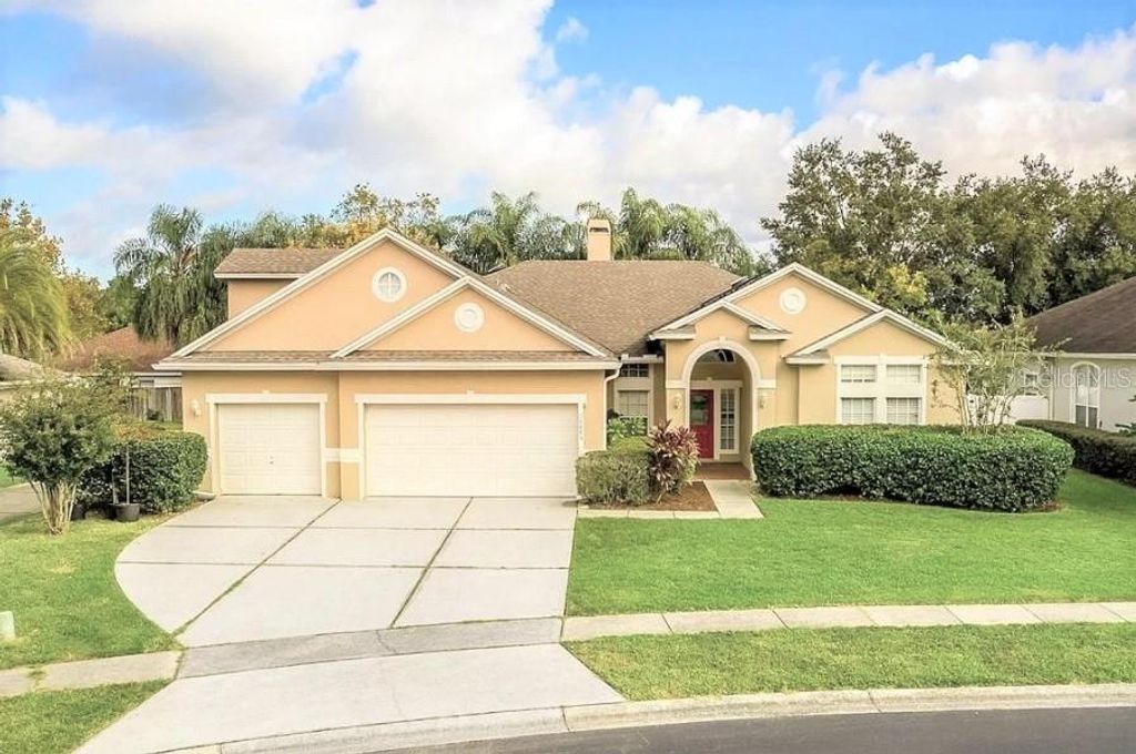 Photo of 10885 Piping Rock Circle, Orlando, FL 32817 (MLS # O6411179)