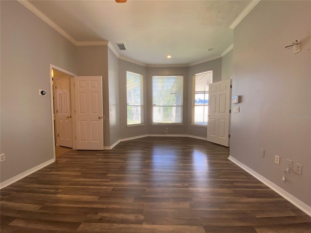 Photo of 10885 Piping Rock Circle, Orlando, FL 32817 (MLS # O6411179)