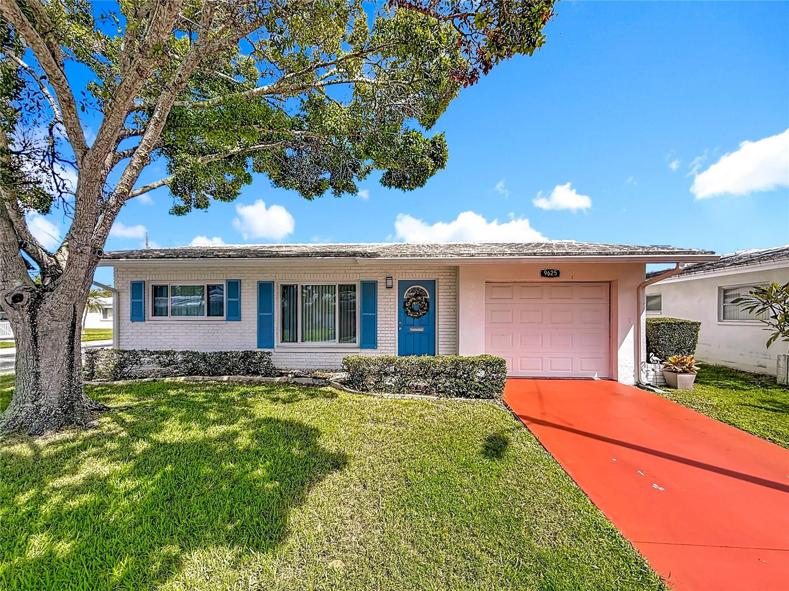 If you are looking for a MOVE-IN READY opportunity in the highly desirable 55+ Mainlands community look no further! 2 bedroom, 2 bath single family home located on a corner lot has great curb appeal and offers a 10x10 rear patio. Interior offers newer flooring (2018): wood look, wide plank laminate flooring throughout. Recently updated Kitchen (2018) includes new cabinets, beautiful granite countertops, stainless steel appliances and sink, high neck faucet, and garbage disposal with a pass through window to the light and bright Florida Room. Master Bedroom can accommodate a King-size Bedroom Suite. Other updates include NEW flat roof (2019), HVAC (2014), electric panel (2015), decorative front door, ceiling fans and New Windows. More recently updates includes remodeled bathrooms, New Driveway, Gutters. The Home and The Roof will be painted by the HOA. Monthly maintenance fee of $469.62 includes 2 digital cable boxes, internet, lawn care, exterior painting, reclaimed water irrigation, roof repair/replacement and water/sewer/trash! Come join this active 55+ community offering heated Pool, Clubhouse, Shuffleboard, Golf, with Parkside mall, restaurants, banks, interstate, airports, and beaches nearby. 2 pets, any size, welcome! Make this your home before is too late.