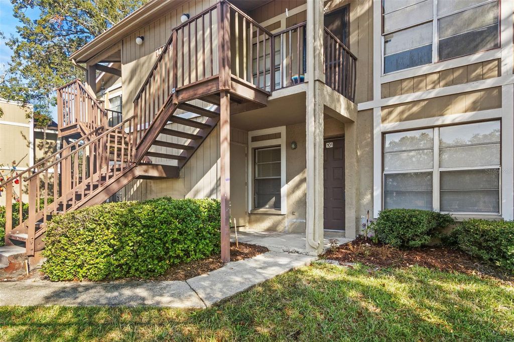 Photo of 14419 Hanging Moss Circle #101, Tampa, FL 33613 (MLS # TB8456208)