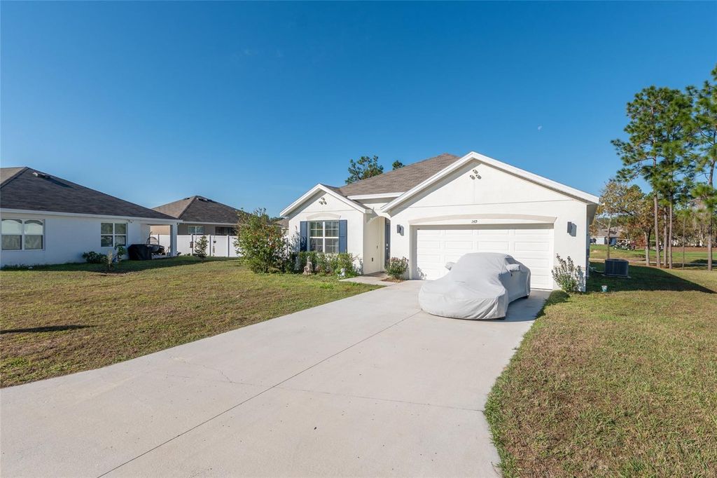 Photo of 149 Hickory Course Circle, Ocala, FL 34472 (MLS # OM723157)