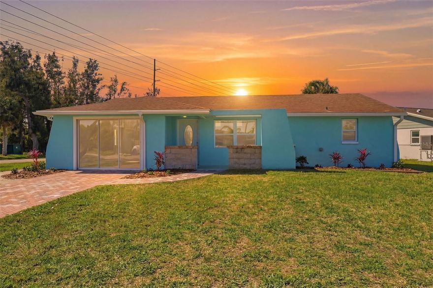 One or more photo(s) has been virtually staged. Fully renovated 3 bedroom, 3 bathroom home located on a spacious corner lot in the desirable Sea Pines community. This move-in ready property features a cohesive, modern design with luxury vinyl plank flooring throughout, updated trim, fresh interior and exterior paint, and all new light fixtures. The home offers a functional split-bedroom layout with two ensuite bedrooms, each featuring granite countertops and beautifully tiled walk-in showers, ideal for guests or multi-generational living. The primary suite includes a walk-in closet with attic access, sliding glass doors for natural light, and a spacious ensuite bath designed with accessibility in mind. The updated kitchen showcases real wood cabinetry, granite countertops, brand new appliances, a large basin sink, garbage disposal, and flush lighting. Additional highlights include a front living room and a rear family room with vaulted ceilings and a stone fireplace, creating multiple spaces to relax and entertain. Major system updates provide peace of mind, including a brand new AC, brand new water heater, new windows and doors, updated electrical, and a roof estimated to be approximately 2–4 years old. Enjoy outdoor living on the tiled, screened-in lanai with ceiling fan, overlooking a uniquely shaped corner lot with views toward nearby canals. The Sea Pines community offers a coastal lifestyle with access to a neighborhood boat ramp and no HOA. Conveniently located near local marinas, dining, and waterfront recreation, this home is perfect for those seeking a relaxed, golf cart-friendly beach community lifestyle.