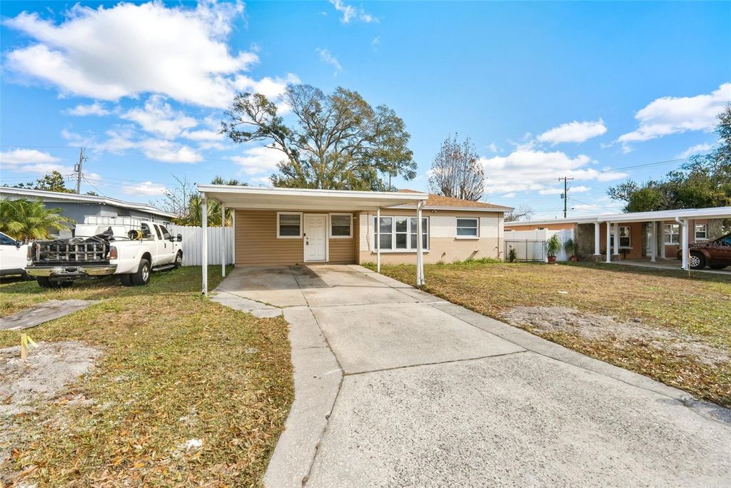 Photo of 6403 N Clark Ave, Tampa, FL 33614 (MLS # TB8473273)