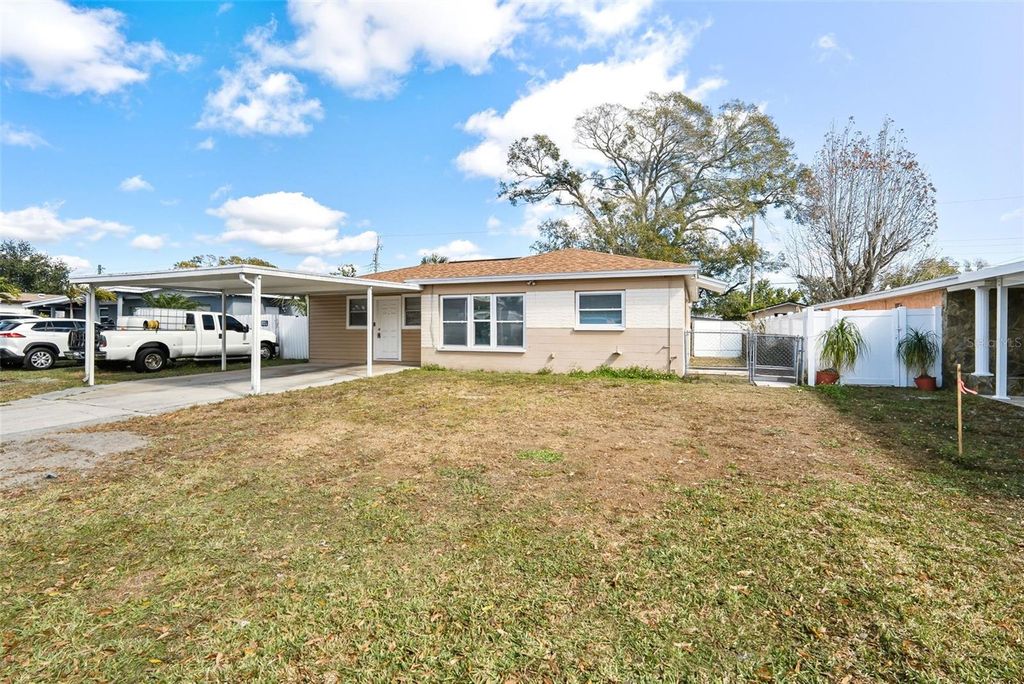 Photo of 6403 N Clark Ave, Tampa, FL 33614 (MLS # TB8473273)