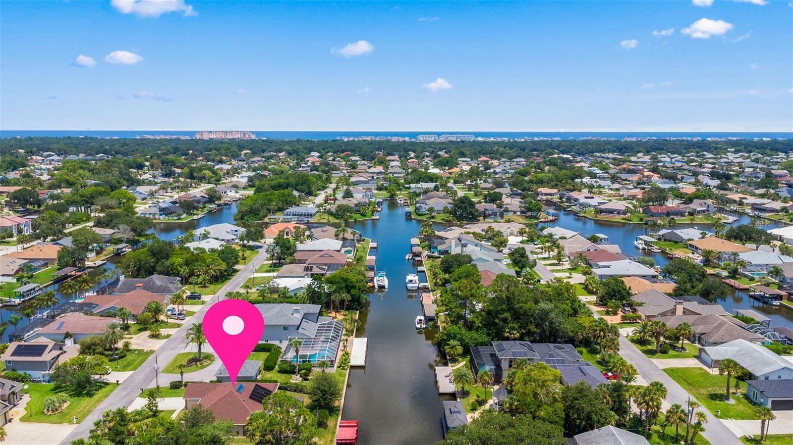 **Discover Your Ideal Waterfront Lifestyle! Just 15 Minutes to Flagler Beach!* Prepare to be amazed by this remarkable waterfront treasure, where endless opportunities meet luxurious coastal living**! Nestled in the sought-after C-section, this custom concrete block home provides everything you've been looking for— this 3-bedroom, 2-bathroom** beauty spanning over 1900 sq ft of living space** is perfect for those who desire it all—**generous living areas, breathtaking views, and a life of ultimate relaxation** in a peaceful Cul-de-Sac. As you step inside, you'll be greeted by a spacious family room ideal for unwinding or hosting lively gatherings. The **expansive living room** is an entertainer's paradise, seamlessly connecting to the kitchen and offering an abundance of space for family fun, celebrations, or simply enjoying the luxury of having room to breathe. Picture yourself cooking in a bright, open kitchen with **panoramic water views and a sparkling blue pool as
your back drop** it's the perfect setting for meal preparation while basking in the natural beauty of your surroundings. The master suite serves as a private sanctuary, featuring 2 walk in closets for him and her. The oversized space in the owner's bathroom is ready for you to create your personal spa oasis**a serene space to relax and rejuvenate after a long day. For those who value space and practicality, the oversized laundry room offers ample storage! When you step outside, prepare to be awestruck! The vast pool deck** is the perfect venue for entertaining, sunbathing, or hosting unforgettable pool parties. The **36x31 foot pool deck** is your own private paradise**ideal for cooling off, leisurely floating on a sunny afternoon, or enjoying year-round swimming in Florida's warm climate. But there's more your **private boat dock provides direct water access, allowing you to fully embrace the waterfront lifestyle. Envision yourself watching dolphins swim, casting a line for dinner, or simply relaxing by the water, soaking in the stunning views and sounds of nature. Whether you're dining at a local beachside restaurant or lounging on the shore, the best of coastal living is right at your fingertips. With a **newer roof (2023) and newer AC unit (2022)**, New paint, New luxury vinyl flooring, new microwave, new bathroom vanity, hurricane shutters, sprinkler system, termite bond and more! You can move in with confidence and start enjoying your salt life right away. This home is not merely a place to liveit's a lifestyle, an experience, and a dream fulfilled. Don't let this chance pass you by**schedule your private showing today and claim this *waterfront haven* as your own!