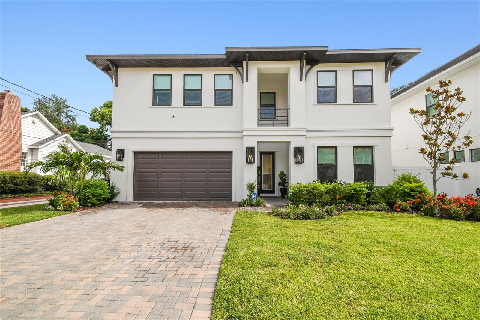 Discover this exquisite new custom-built home located in one of the most desired and quiet neighborhoods in South Tampa. Just walking distance from from the iconic Bayshore Boulevard. Boasting 5 spacious bedrooms, 4 full bathrooms, and a dedicated office, this residence is thoughtfully designed with high-end finishes and timeless elegance throughout. Step inside to find rich hardwood flooring, soaring ceilings, a custom-crafted stairwell, and windows framed with elegant 3.5" Delta Howe casing. The oversized kitchen is a chef’s dream, complete with 42" cabinetry, a custom butler’s pantry, and a spacious eat-in area. The open-concept layout flows effortlessly into the great room and formal dining space—perfect for entertaining. Sliding glass doors lead to a covered lanai and a fully fenced backyard, ideal for gatherings or quiet evenings outdoors.
The exterior features pavers on the driveway, front porch, and back lanai, creating a seamless blend of style and function. Additional highlights include custom built-out closets, a whole-house generator, designer window treatments, and many more premium upgrades.Â
A private downstairs bedroom with a full bath offers flexibility and could easily serve as a guest suite or pool bath. Upstairs is equally as impressive with a custom build in bench and open hallway. The luxurious owner’s retreat features a generously sized bedroom, two large walk-in closets, and a spa-like ensuite bath with a double vanity, an oversized standalone soaking tub, and a separate glass-enclosed shower. The secondary bedrooms are large and 2 of the bedrooms share a jack and jill bathroom with private vanities while the 4th upstairs bedroom has a private en suite bathroom.   Enjoy the convenience of being within walking distance to Bayshore Boulevard, shopping, dining, the YMCA, and top-rated schools—Roosevelt, Coleman, and Plant. Quick drive to downtown and  easy access to the Selmon Expressway,  this home truly has it all.  Call me today for your private tour.
