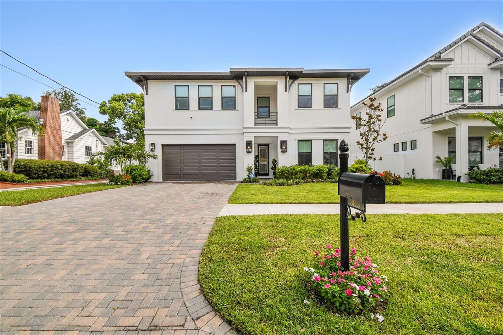 Discover this exquisite new custom-built home located in one of the most desired and quiet neighborhoods in South Tampa. Just walking distance from from the iconic Bayshore Boulevard. Boasting 5 spacious bedrooms, 4 full bathrooms, and a dedicated office, this residence is thoughtfully designed with high-end finishes and timeless elegance throughout. Step inside to find rich hardwood flooring, soaring ceilings, a custom-crafted stairwell, and windows framed with elegant 3.5" Delta Howe casing. The oversized kitchen is a chef’s dream, complete with 42" cabinetry, a custom butler’s pantry, and a spacious eat-in area. The open-concept layout flows effortlessly into the great room and formal dining space—perfect for entertaining. Sliding glass doors lead to a covered lanai and a fully fenced backyard, ideal for gatherings or quiet evenings outdoors.
The exterior features pavers on the driveway, front porch, and back lanai, creating a seamless blend of style and function. Additional highlights include custom built-out closets, a whole-house generator, designer window treatments, and many more premium upgrades. 
A private downstairs bedroom with a full bath offers flexibility and could easily serve as a guest suite or pool bath. Upstairs is equally as impressive with a custom build in bench and open hallway. The luxurious owner’s retreat features a generously sized bedroom, two large walk-in closets, and a spa-like ensuite bath with a double vanity, an oversized standalone soaking tub, and a separate glass-enclosed shower.  The secondary bedrooms are large and 2 of the bedrooms share a jack and jill bathroom with private vanities while the 4th upstairs bedroom has a private en suite bathroom.   Enjoy the convenience of being within walking distance to Bayshore Boulevard, shopping, dining, the YMCA, and top-rated schools—Roosevelt, Coleman, and Plant. Quick drive to downtown and  easy access to the Selmon Expressway,  this home truly has it all.  Call me today for your private tour.