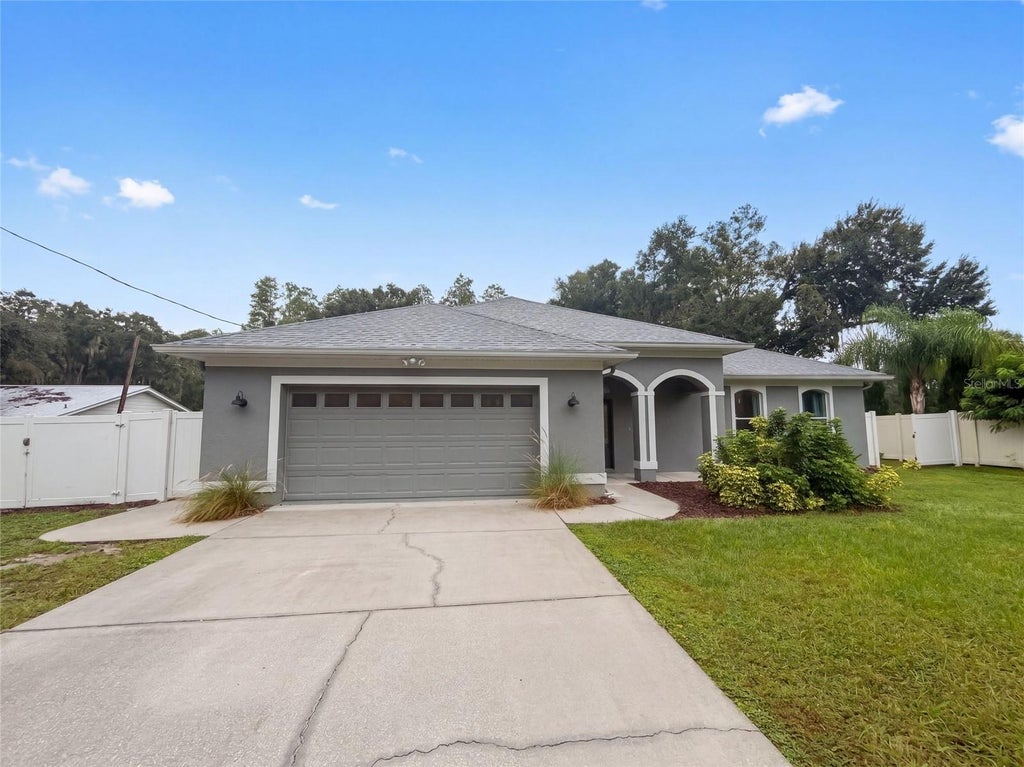 Photo of 219 Willow Bend Parkway, Lutz, FL 33549 (MLS # O6448666)