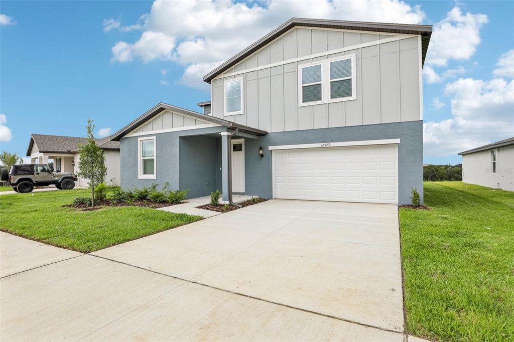 Photo of 12579 Hourglass Way, Dade City, FL 33525 (MLS # TB8545275)