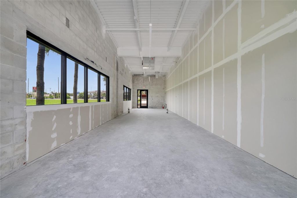 Photo of 3370 Rouse Road #101, Orlando, FL 32817 (MLS # O6382510)