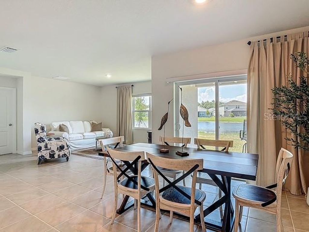 Photo of 2219 Lake Preserve Circle, New Smyrna Beach, FL 32168 (MLS # NS1086904)