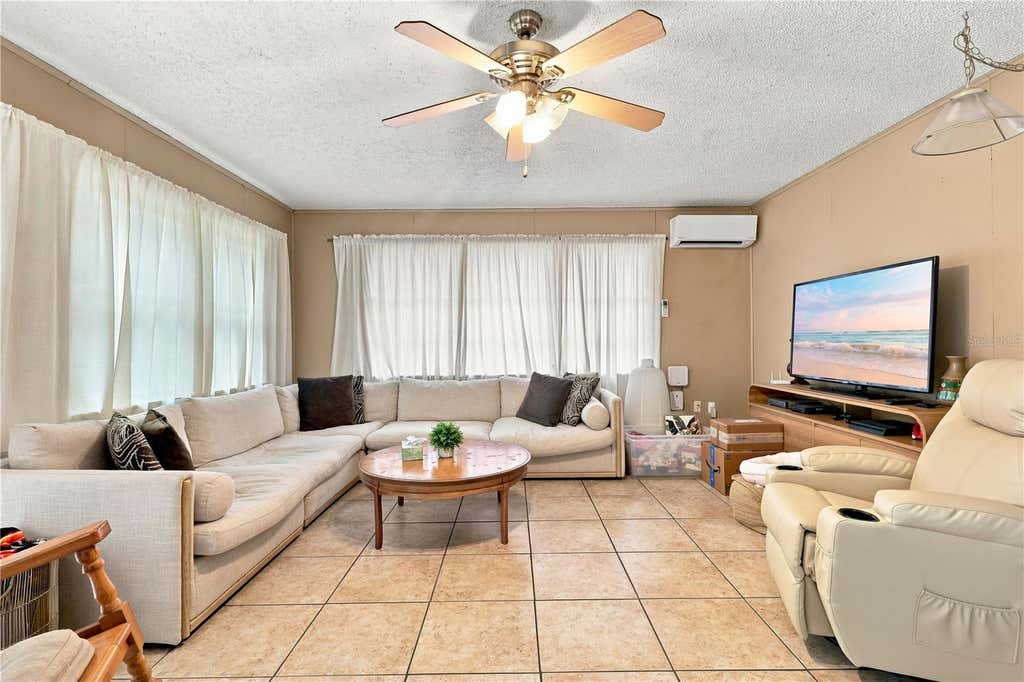 Photo of 502 Mary Sue Street, Fruitland Park, FL 34731 (MLS # O6434882)