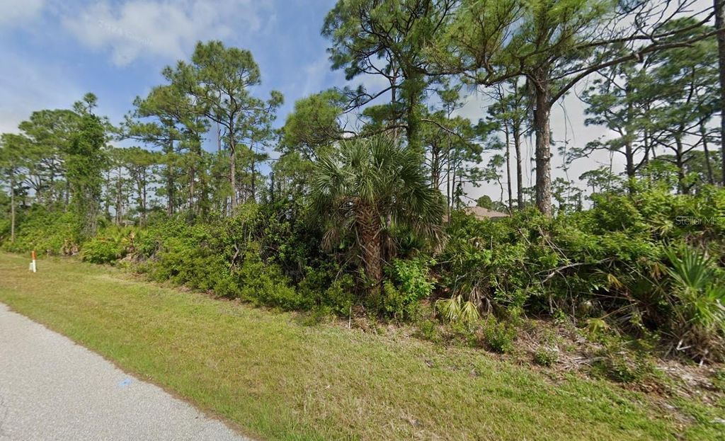 Photo of 12534 Steen Terrace, Port Charlotte, FL 33981 (MLS # O6284031)