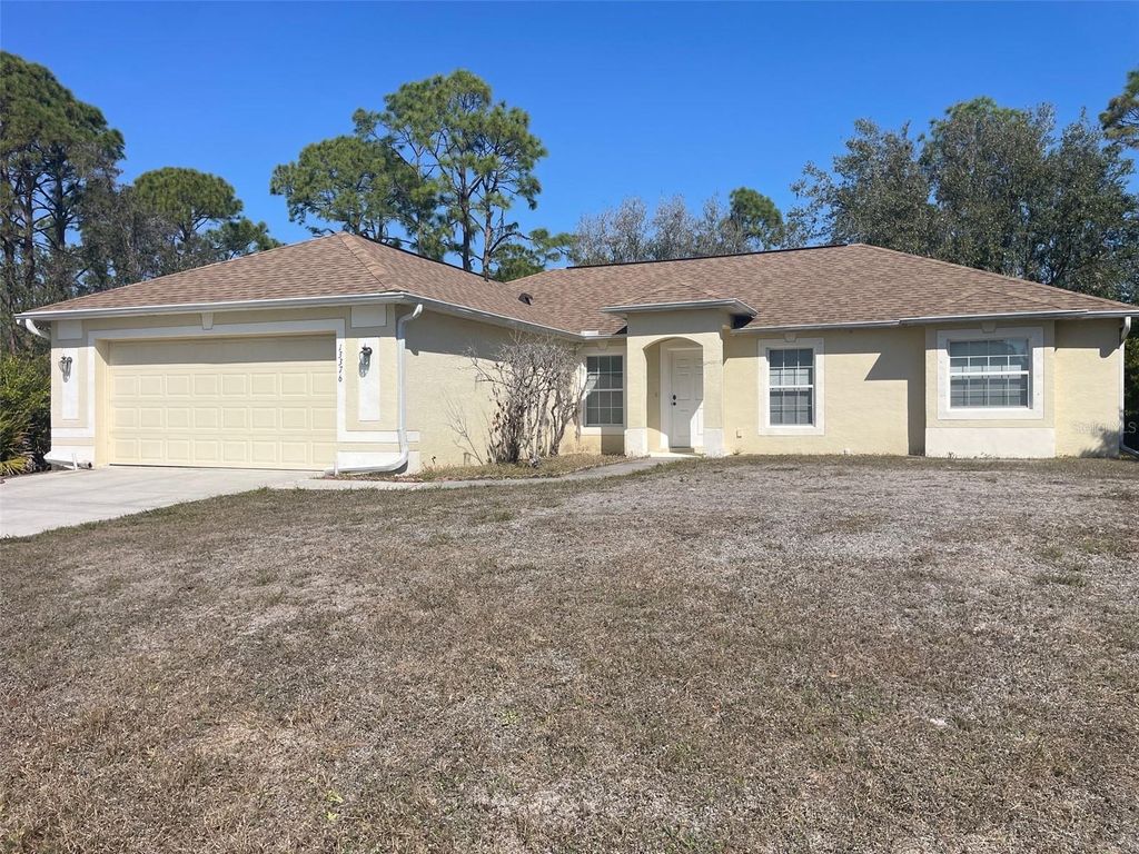 Photo of 13376 Ranett Avenue, Port Charlotte, FL 33953 (MLS # C7522086)
