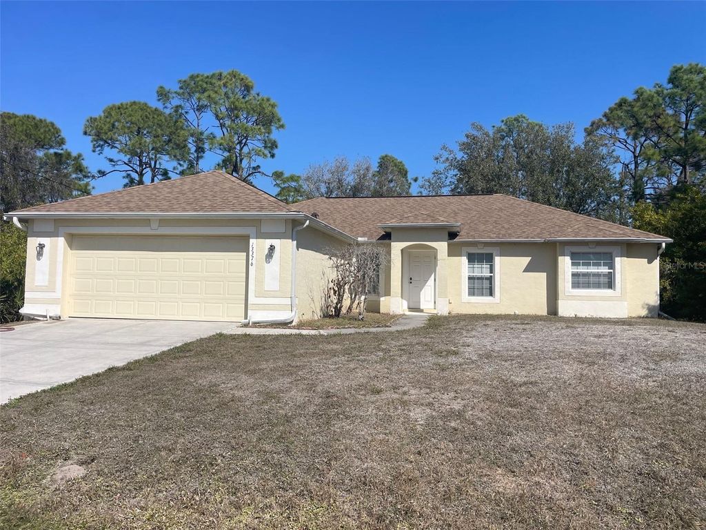 Photo of 13376 Ranett Avenue, Port Charlotte, FL 33953 (MLS # C7522086)