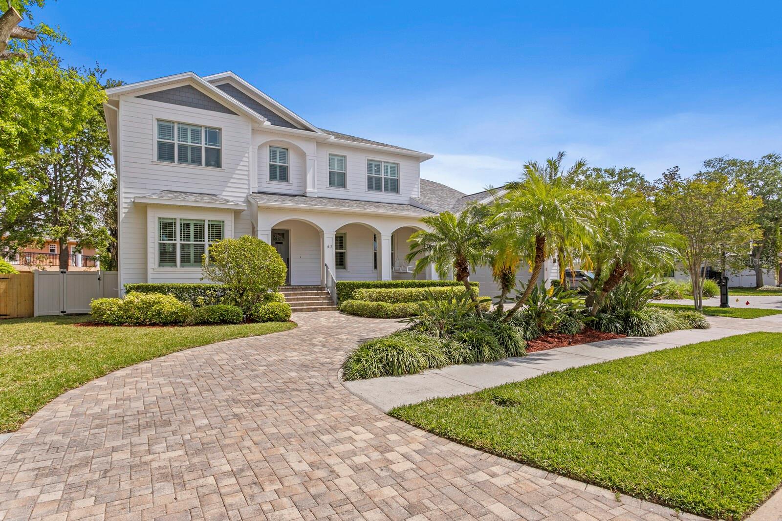 Welcome to 47 Martinique, a stunning home nestled on one of the most coveted streets on Davis Islands! This meticulously crafted Devonshire home boasts two-story solid block construction, offering durability and peace of mind. Step into the heart of the home where you will find quality finishes, 10 foot ceilings, and a very functional living space. The first floor features an expansive guest suite, home office, living room, and large family room. The beautiful kitchen welcomes you with a spacious center island, Thermador appliances, 5 burner gas cooktop, wood cabinetry, granite countertops and an oversized breakfast room. French doors in the family lead to a screened in patio with brick pavers, creating an inviting outdoor entertainment space for all to enjoy. While outside, take a dip in saltwater pool complete with heated spa, entertainment patio and privacy fenced backyard. Upstairs, find the spacious primary suite, complete with two large walk-in closets, coffered ceiling, soaking tub, granite countertops, dual sinks, and walk-in shower. The second floor also includes a laundry room with storage, a junior suite with a private en suite bathroom and two additional bedrooms with an expanded Jack-n-Jill bathroom design.
Other amenities include a new roof in 2025, new pool equipment, new ductwork, new LED lighting throughout, interior and exterior paint 2025, tankless hot water heater, custom closets, custom plantation shutters, circular paver driveway and updated lush tropical landscaping. Davis Islands is a golf cart community with a vibrant downtown area of shops, eateries and businesses. It also has a municipal airport, public marina, walking/running/bike paths, parks, playgrounds, tennis courts, top hospital (Tampa General) and prestigious medical complex (USF). This home is located within one of South Tampa’s most sought after school districts (Gorrie/Wilson/Plant). Property has a transferable flood insurance policy.