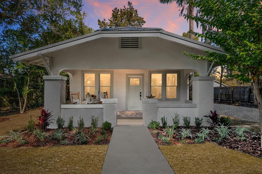 Step inside and feel this 1938 Bungalow giving you a warm little wink with timeless charm. Sunlight dances through every room with original pine floors and vintage wavy glass windows. This 3/2 is completely restored and welcomes you with a spacious covered front porch, perfect for rocking or swinging. A new kitchen—featuring exposed brick accents, quartz countertops, and brand new appliances. The renovated bathrooms shine with marble floors and period-inspired penny tile, offering a graceful nod to her past while ensuring today's comforts. Behind the scenes, she’s been updated where it matters most, with all-new plumbing, new electric panel and wiring, new HVAC, and a 2014 metal roof. The spacious backyard is ready for gardening, entertaining, or a peaceful retreat, and the bonus workshop/storage building is perfect for hobbies or projects. Nestled in Ocala’s beloved Golf Cart District, this Bungalow sits just a cheerful stroll from 8th Street Elementary, Osceola Middle, and the vibrant Downtown Square—full of dining, shopping, and community events.  With no HOA or deed restrictions, the location offers wonderful flexibility, making it an excellent option for a full-time residence, seasonal home, or potential short-term rental thanks to its proximity to Ocala’s most sought-after attractions. She’s full of history, heart, and hope for her next homeowner.