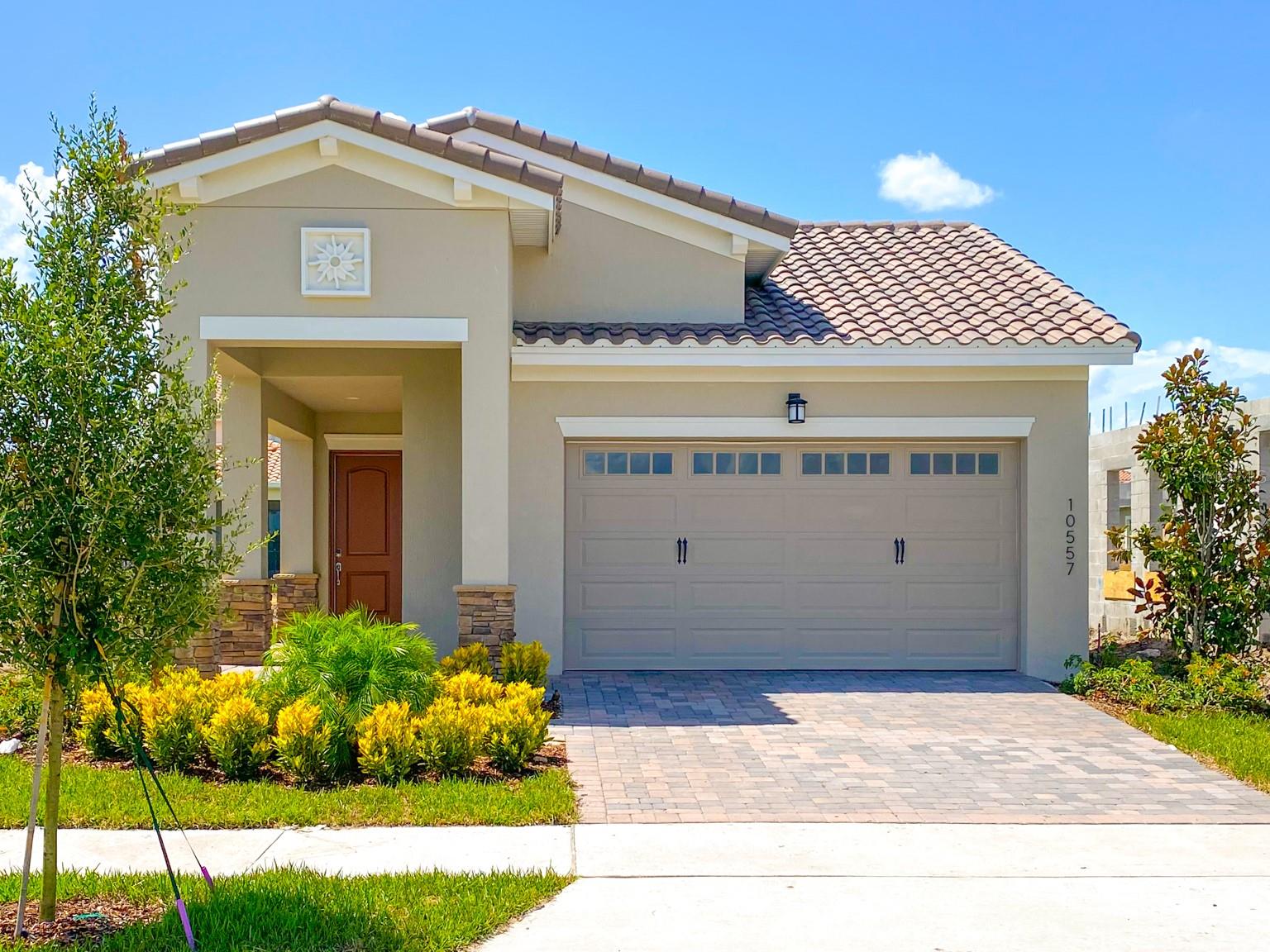 This beautiful and bright single-family home is located in the Security Gated Golf Community of Eagle Creek, right in the heart of Lake Nona
Medical City. The home features 3 bedrooms, 2 bathrooms, and an oversized 2-car garage, complete with all the upgrades you could want. As
soon as you step inside, you'll be impressed by the sleek and stylish wood-inspired ceramic tile, a chef's dream gourmet kitchen with built-in
appliances, and a hooded kitchen vent. The jaw-dropping waterfall granite island is complemented by the designer backsplash and all energyefficient Whirlpool appliances. The master bedroom is a true oasis, with a coffered ceiling, barn door entry to the ensuite bathroom, double
vanity sinks, a large walk-in closet, and a frameless glass walk-in shower. The split floor plan includes two additional bedrooms and a full-sized
bathroom with matching granite and cabinets. When you step outside, you'll appreciate that lawn care is included in the rental price. And with
the washer and dryer included, you won't have to worry about the hassle of laundry either. The surrounding community is filled with great public
schools and convenient amenities, including nearby parks, restaurants, and shops. Don't miss out on the chance to call this picture-perfect home
your own. Pets OK with approval!! (Breed restrictions apply)