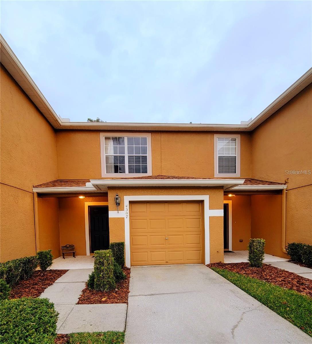 Charming 2 bedroom 2.5 bath Townhome in the highly desired neighborhood of Edgewater at Grand Oaks! As you enter this home, you will be greeted with an open living area, large kitchen, and half bathroom. Sliding glass doors and a large window allow for plenty of natural lighting. Upstairs features 2 large master bedrooms and laundry hook-ups! Both bathrooms have tub/shower combos, perfect for relaxing or bathing young ones! This home is conveniently located close to plenty of shopping and many great restaurants. If you like to stay in, relax on the patio with great conservation views, take a dip in the community pool, or enjoy a walk in this lovely community. Lawncare and water are taken care of, tenant responsible for electric. Unit has a one stall attached garage and new carpets throughout. Don't let this one get away, apply today! This home is professionally managed by Dennis Property Management. This home does require HOA approval of all tenants in addition to home owners approval. HOA Application will be provided to approved applicant. Renter's insurance required.