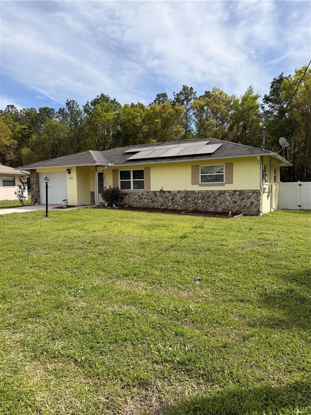 Photo of 1176 W Buttonbush Dr, Beverly Hills, FL 34465 (MLS # W7884053)